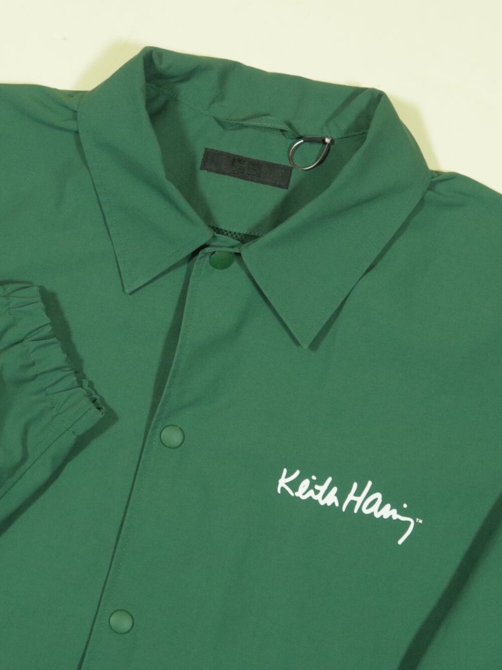 Uniqlo Keith Haring Subway Drawings Coach Jacket Mens L Water Resistant Green
